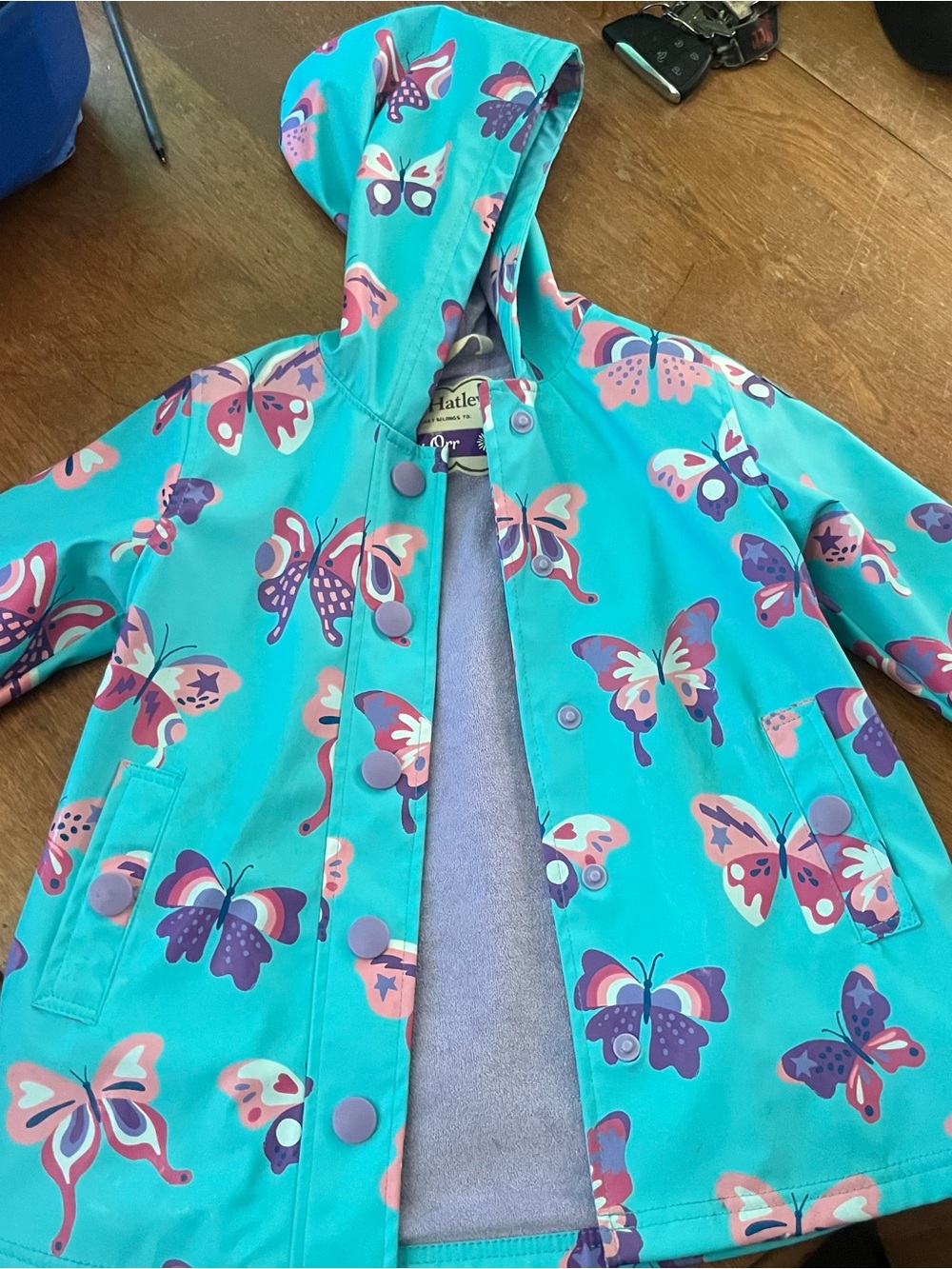 Hatley Turquoise Raincoat with Pink & Purple Butterfly Print